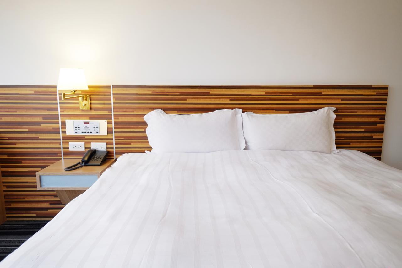 Dynasty Hotel Тайнан Екстериор снимка